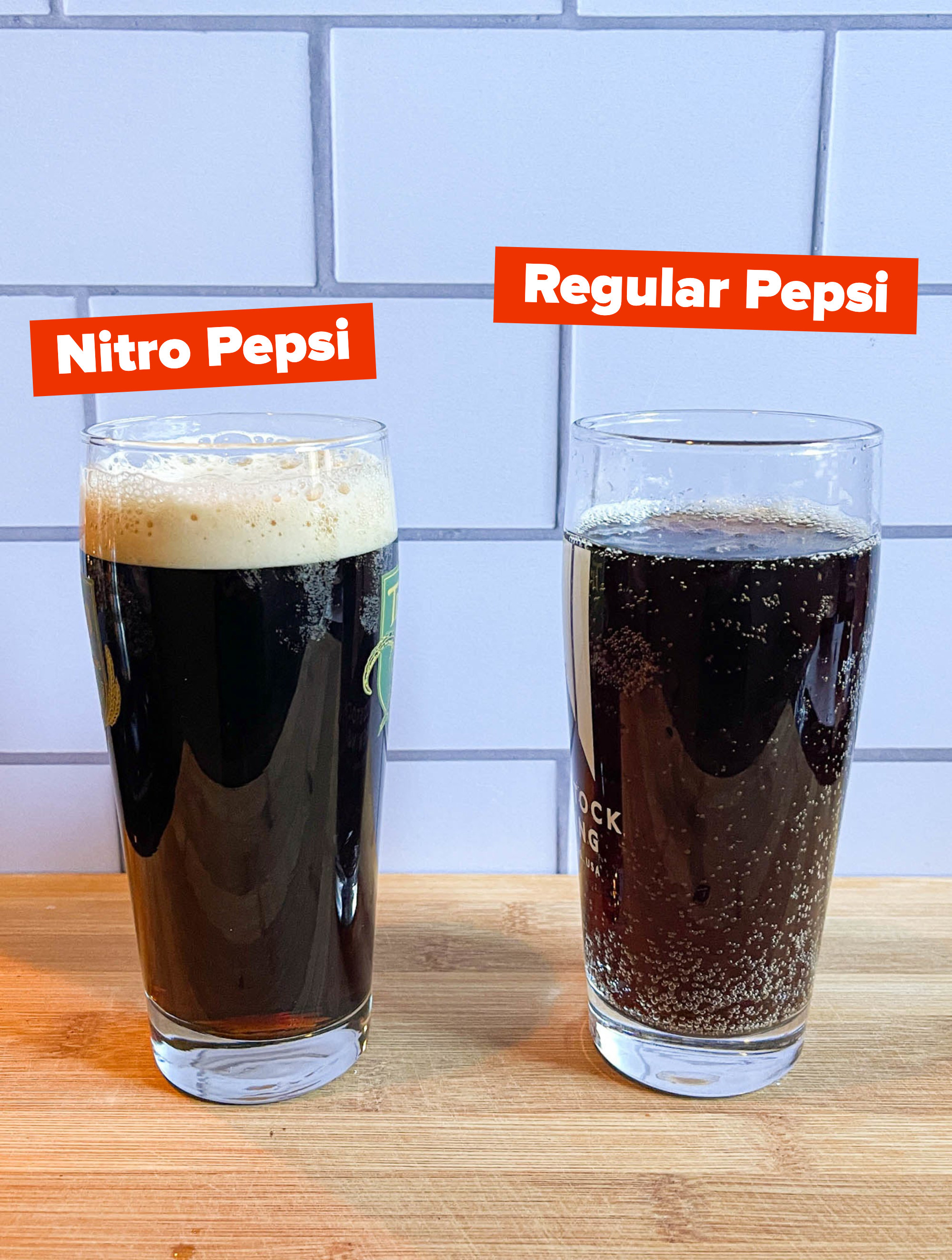 Nitro Pepsi next to regular Pepsi, both in pint glasses