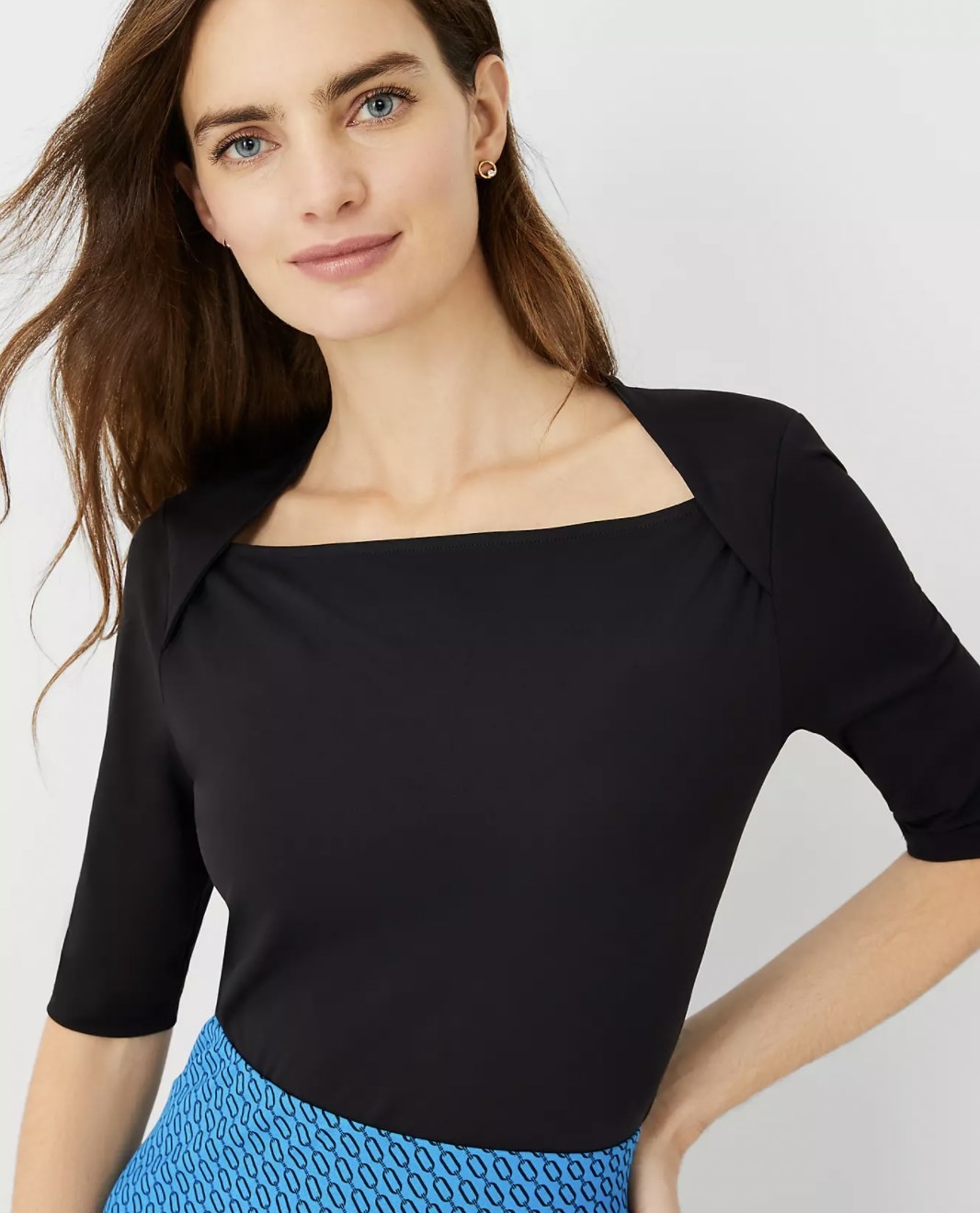 Model wearing the black top with skirt