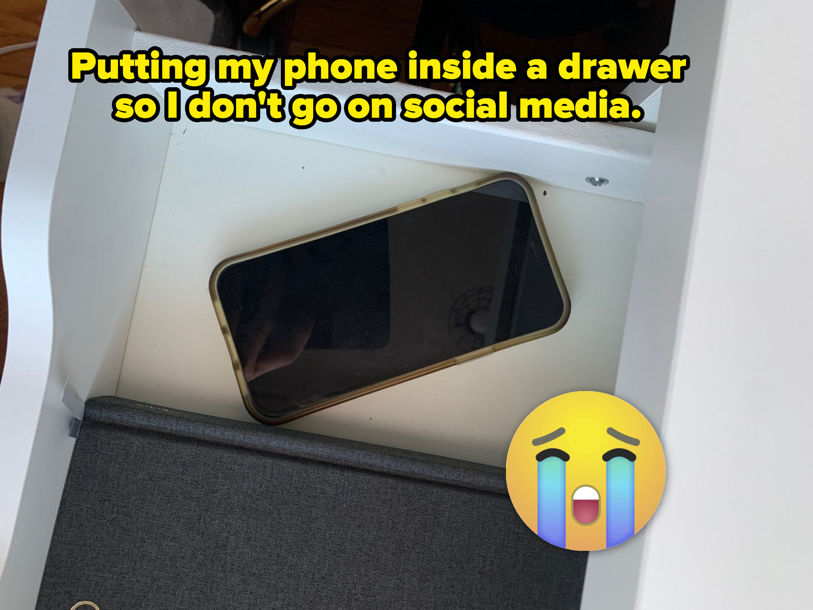 A phone inside a drawer