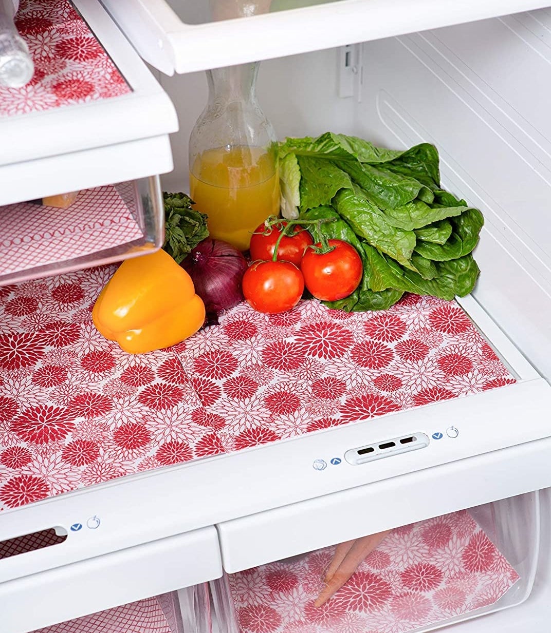 a set of fridge liners on the shelves of a refrigerator