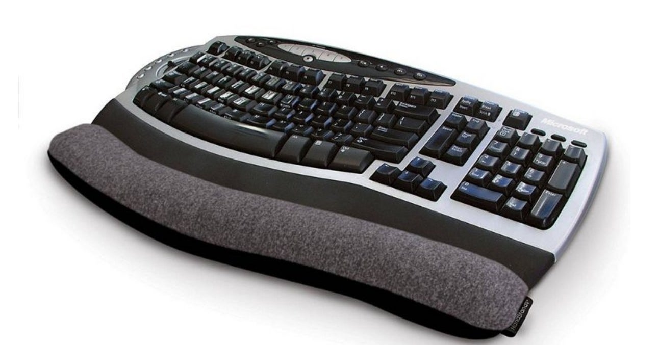 Gray wrist pad at bottom of keyboard