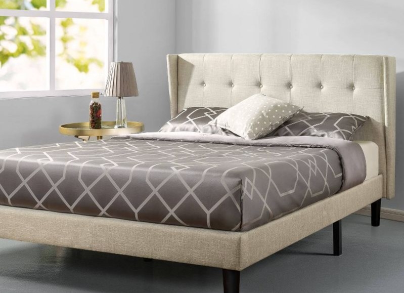 A image of a wingback platform bed frame