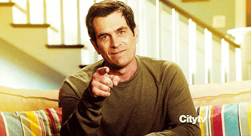 Ty Burrell giving the thumbs-up sign and then pointing to you