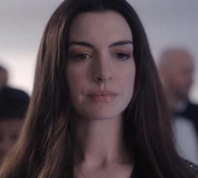Anne Hathaway thinking about something