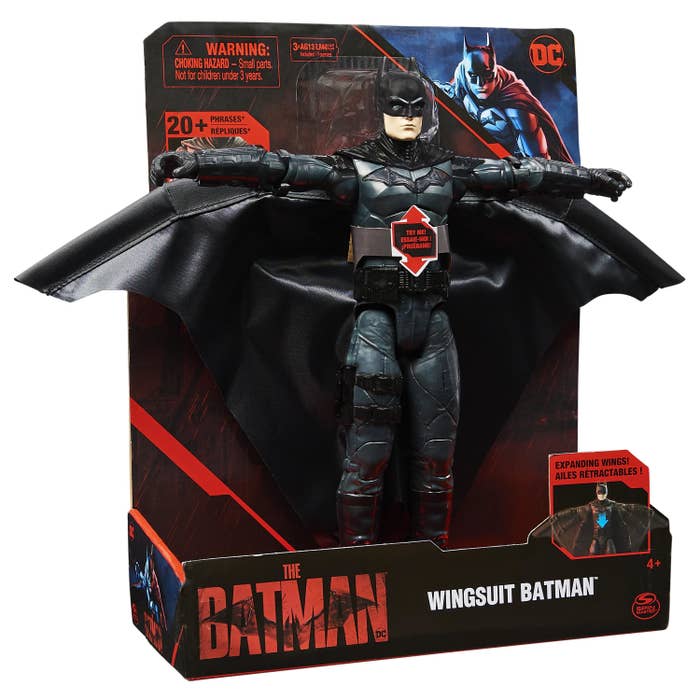 The Wingsuit Batman™ 12" Figurine, with winged arms outstretched, in the packaging