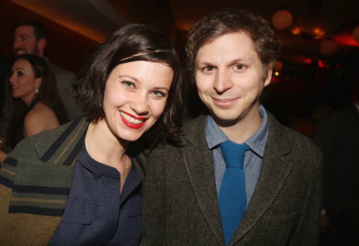 Michael Cera with wife Nadine both wearing coats