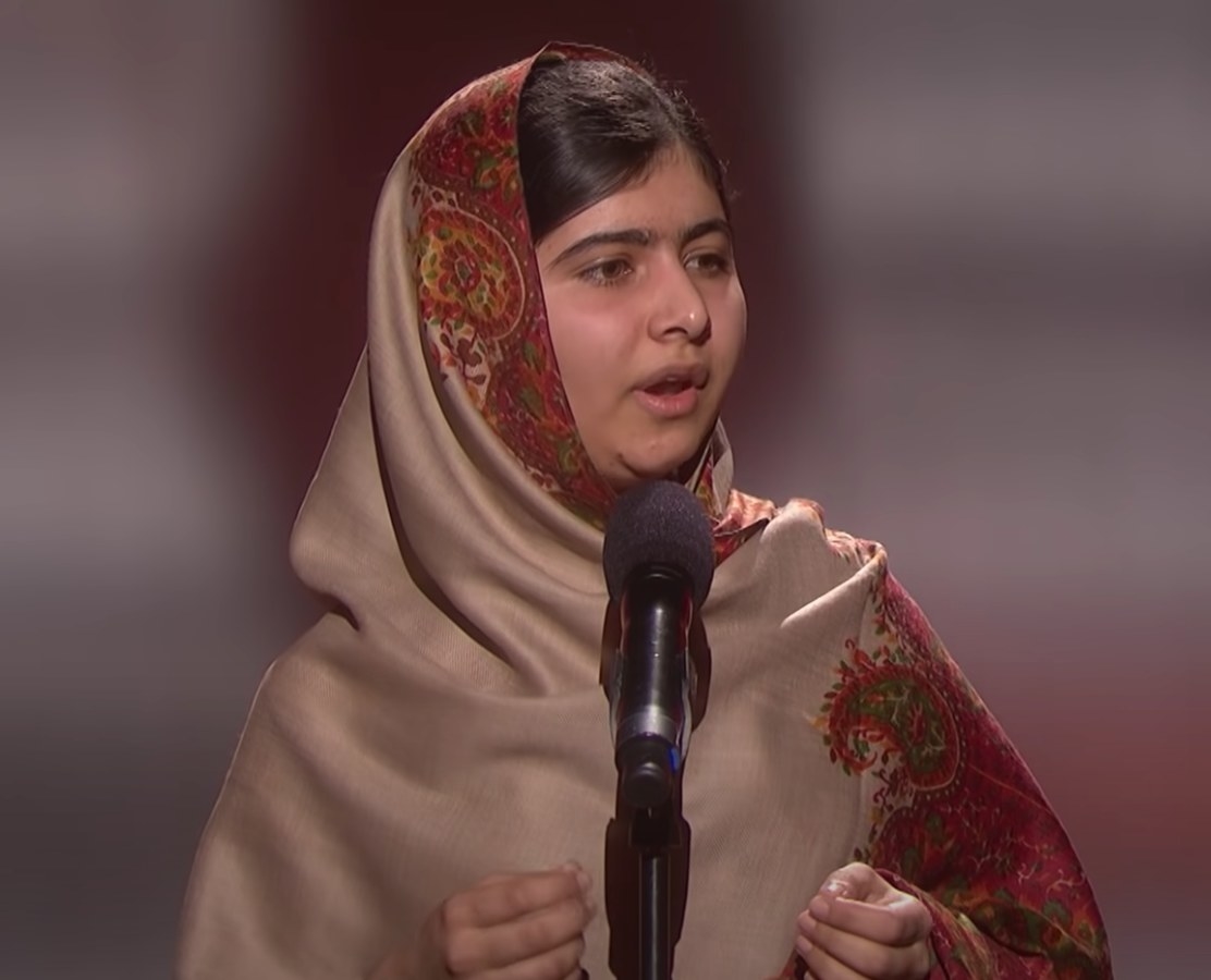 Malala Yousafzai speaks onstage at the 2015 Nobel Peace Prize Concert about the importance of educating all children