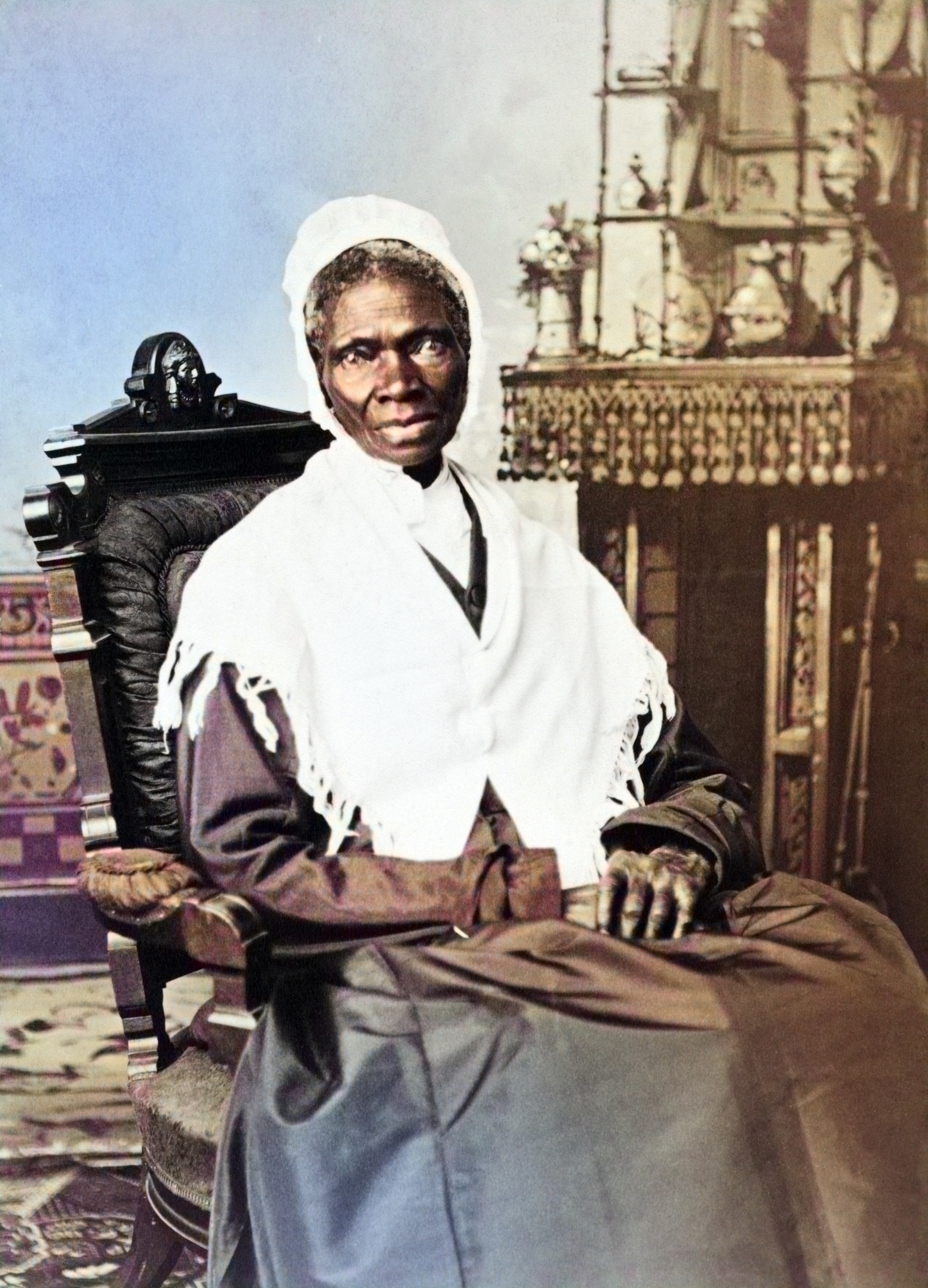 Sojourner Truth sits in a chair in a portrait from 1870