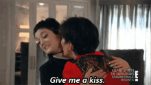 Kris forcefully kissing Kylie