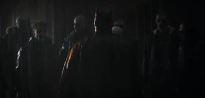 Batman standing in front of a gang in &quot;The Batman&quot;