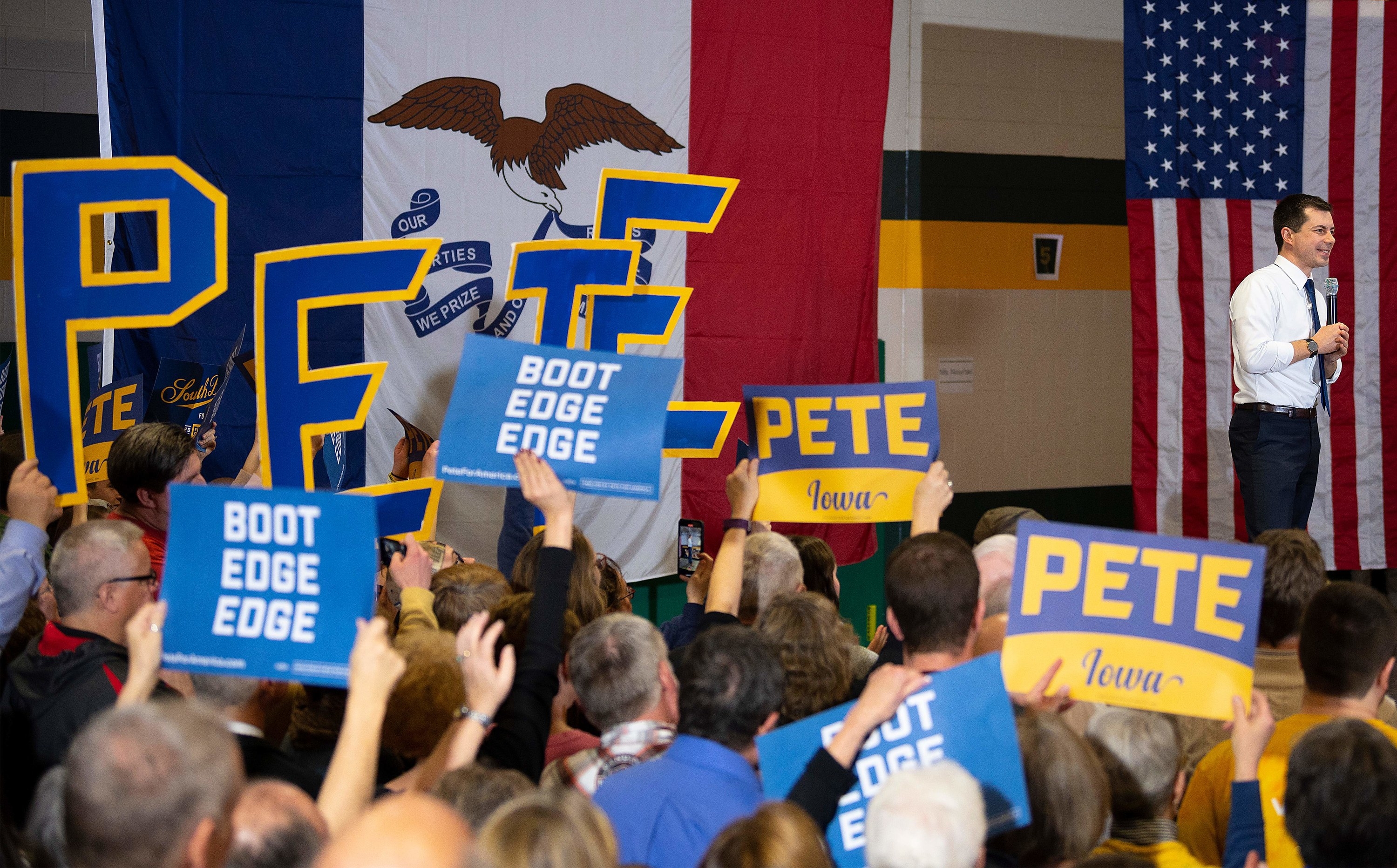 Pete speaking onstage during a campaign stop