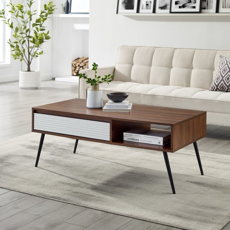 a dark wood coffee table with with accents
