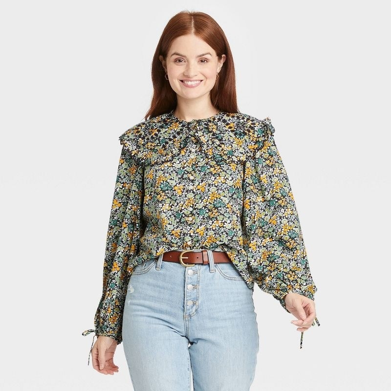 model wearing floral shirt