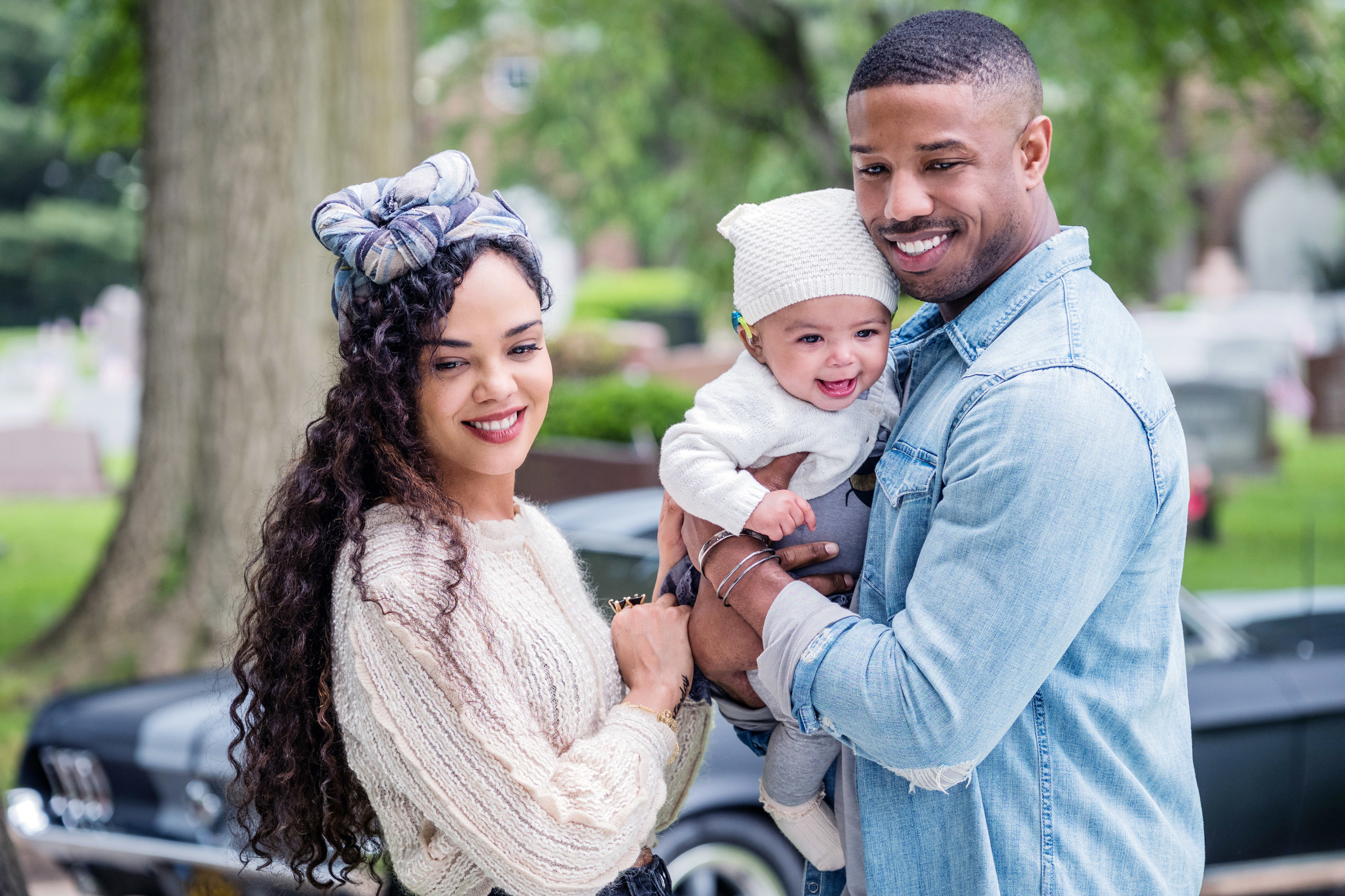 Donnie and Bianca hold their baby together