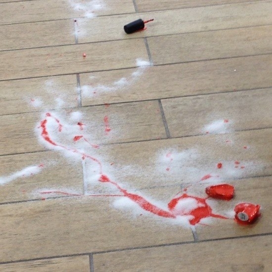 Blogger&#x27;s photo of sugar sprinkled on nail polish spilled on the floor