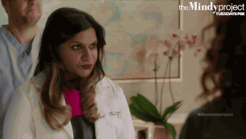 Shocked Mindy Lahiri dealing with a patient