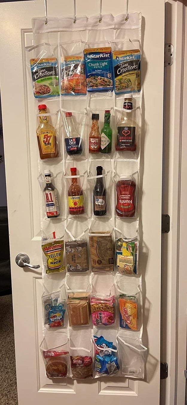 Reviewer photo showing the shoe organizer filled with pantry products