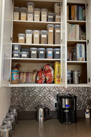 after photo of the same cabinet looking much more organized with the food storage containers