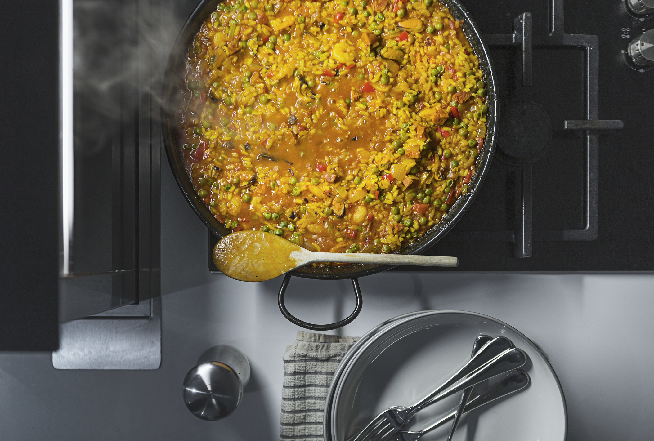 Cooking paella on the stovetop.