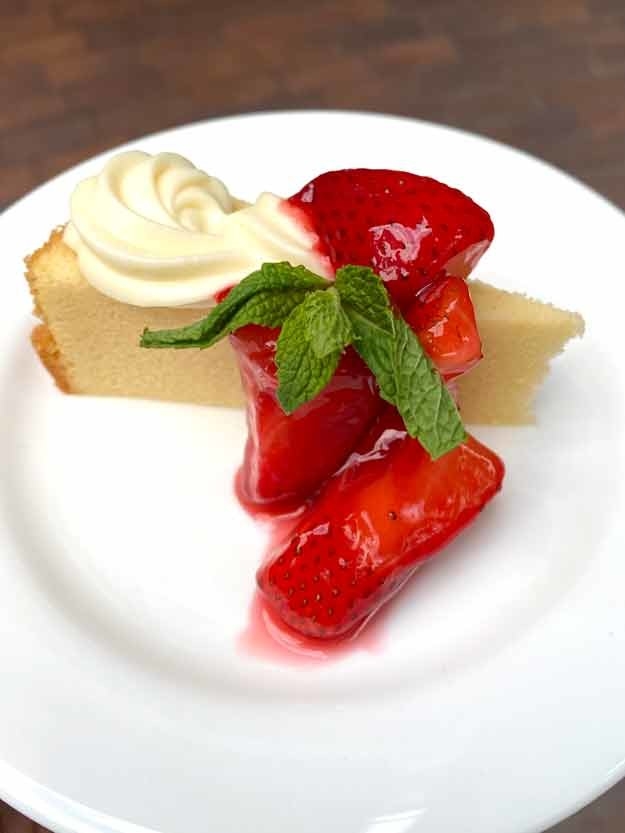 close-up of shortcake with fresh strawberries on it
