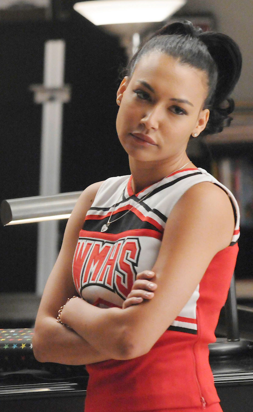 Naya as Santana in her cheerleading uniform