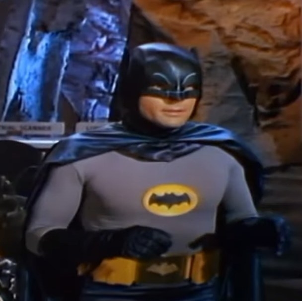 Adam West as Batman about to fight some crime