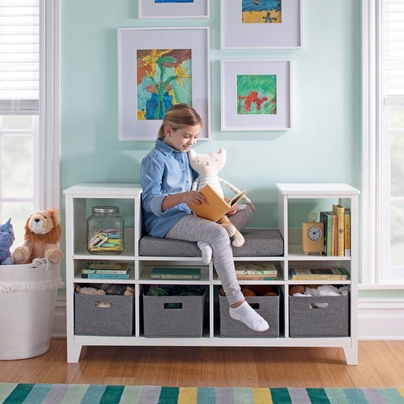 Child reading in reading nook