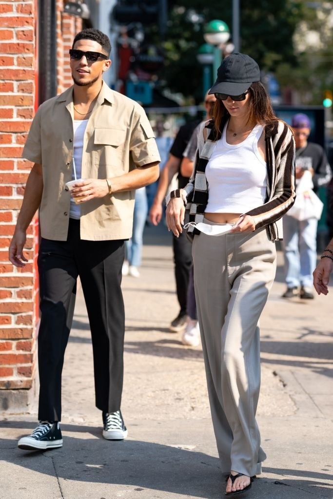 both sporting sunglasses, Kendall and Dustin walk through SoHo together