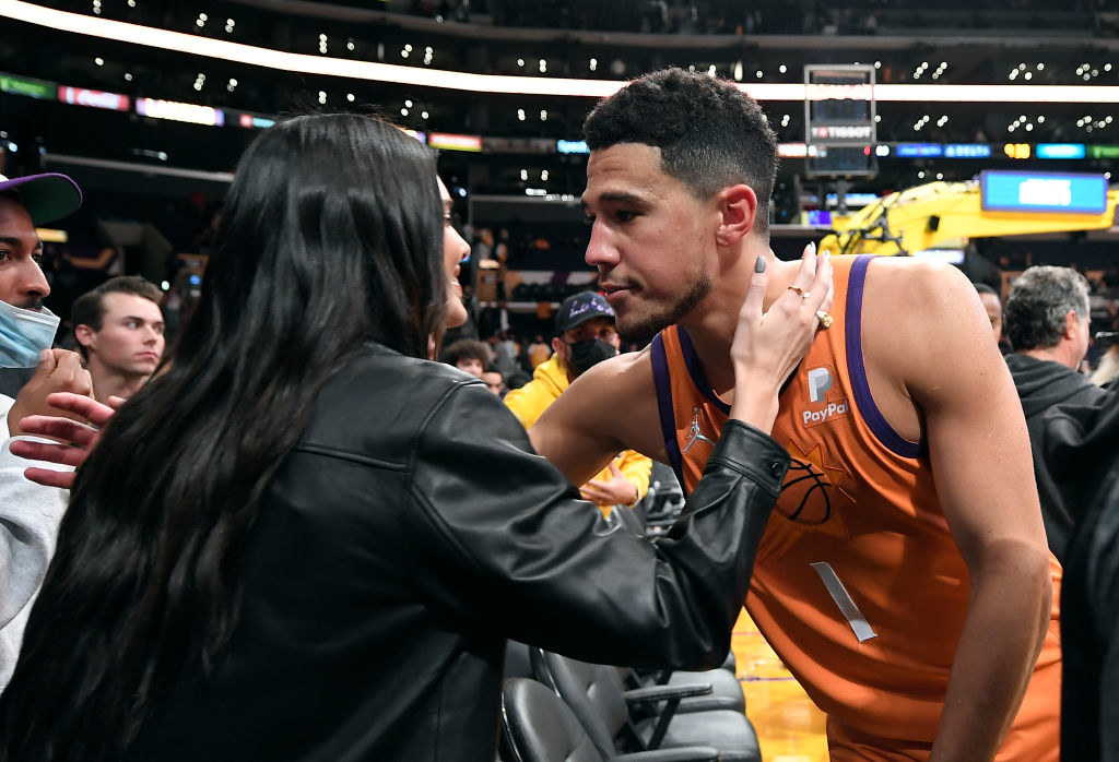 at one of his games, Devin runs over to the sidelines to hug Kendall, who&#x27;s watching courtside