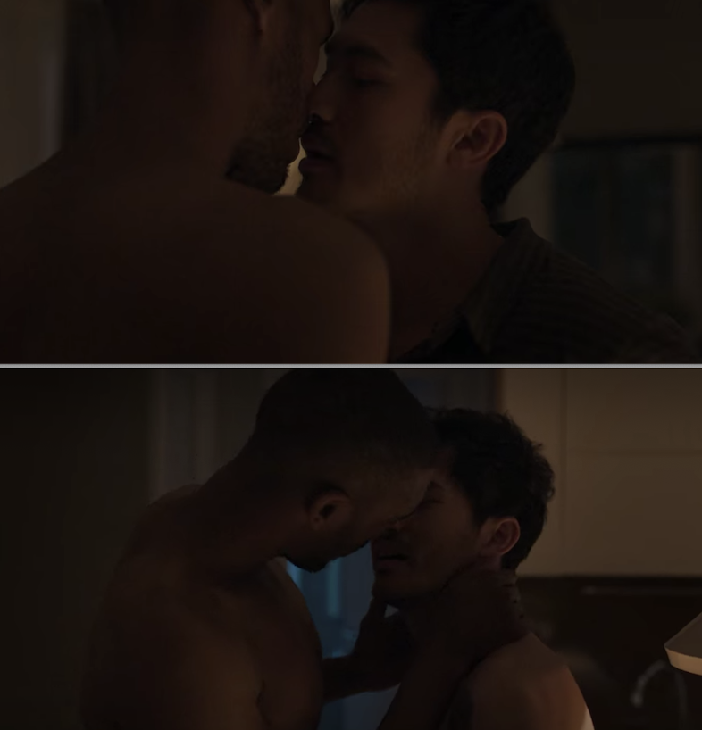 Henry Golding kissing another man in "Monsoon"