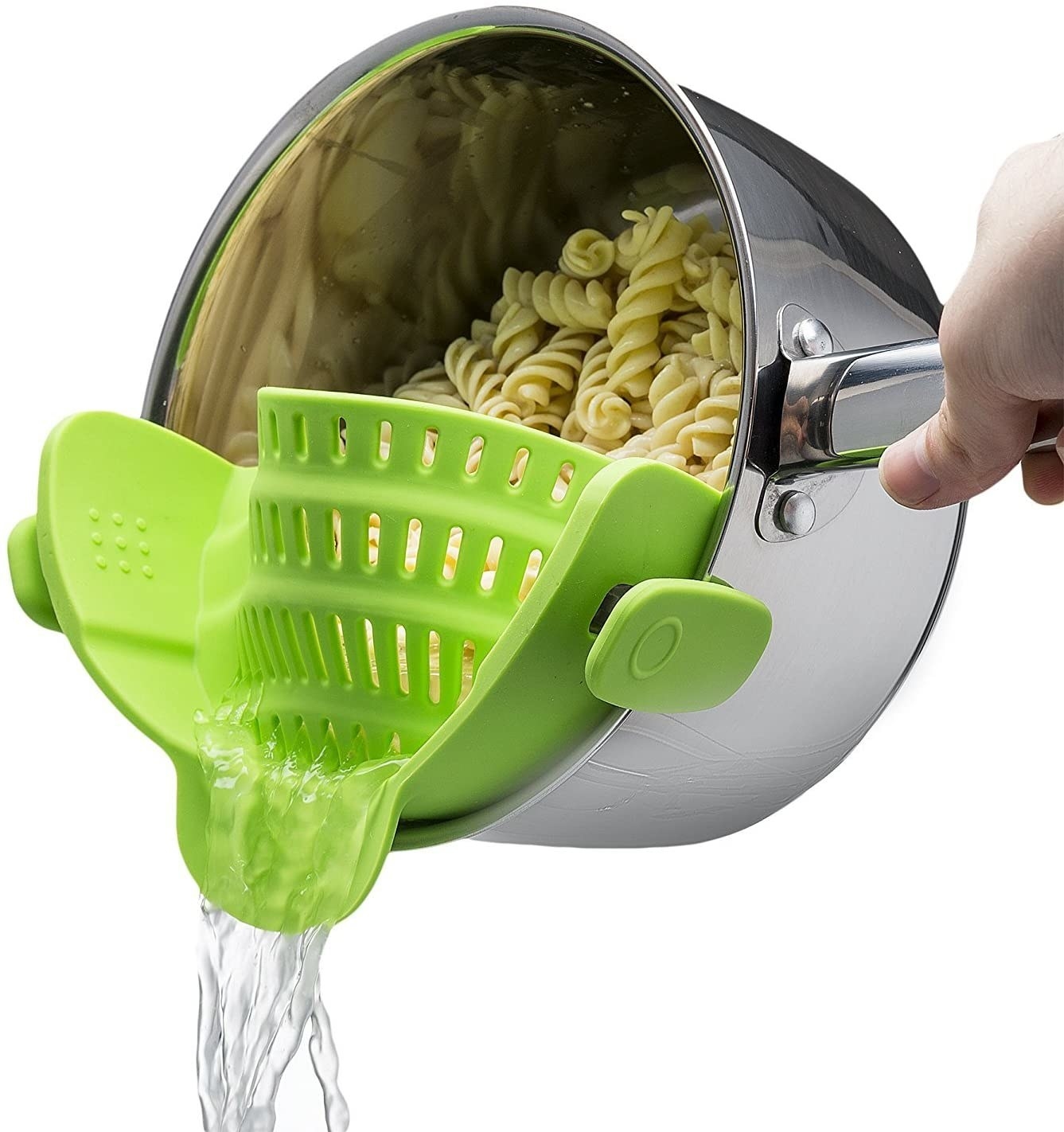 A person pouring water out of a pot of cooked noodles with the clip on strainer