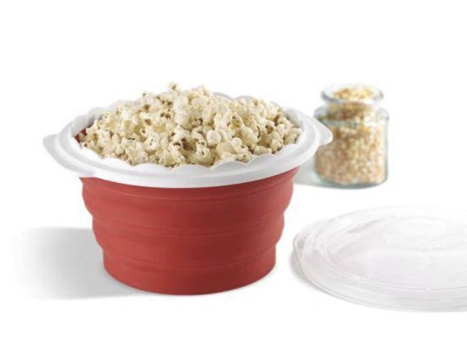 The collapsible popcorn bowl filled with popcorn