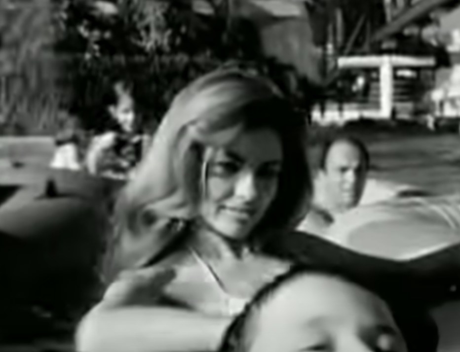 Eva Mendes lounges in a pool in the music video for &quot;Se A Vida E (That&#x27;s the Way Life Is)&quot;