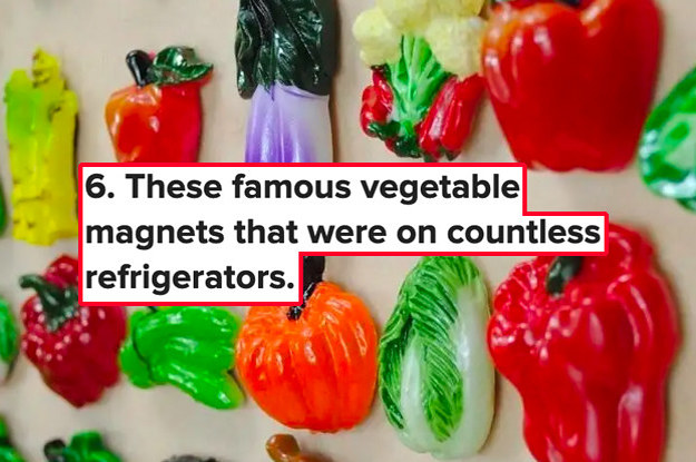 A fridge covered in vegetable magnets