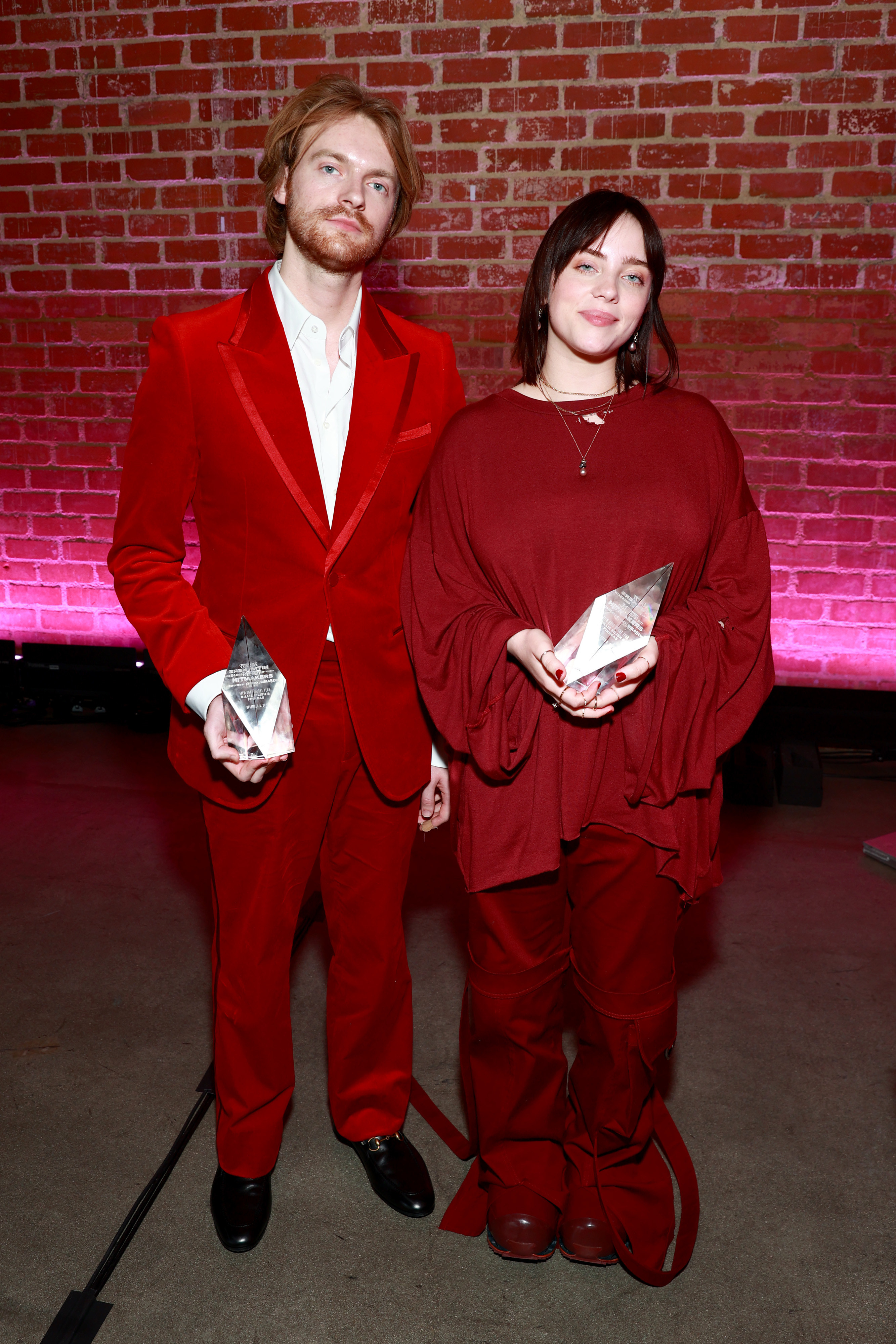 Finneas and Billie Eilish pose at Variety&#x27;s Hitmakers Brunch with their awards on December 04, 2021