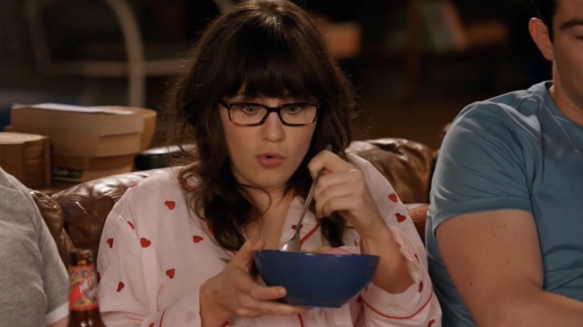 Jess looking at a bowl of cereal in New Girl