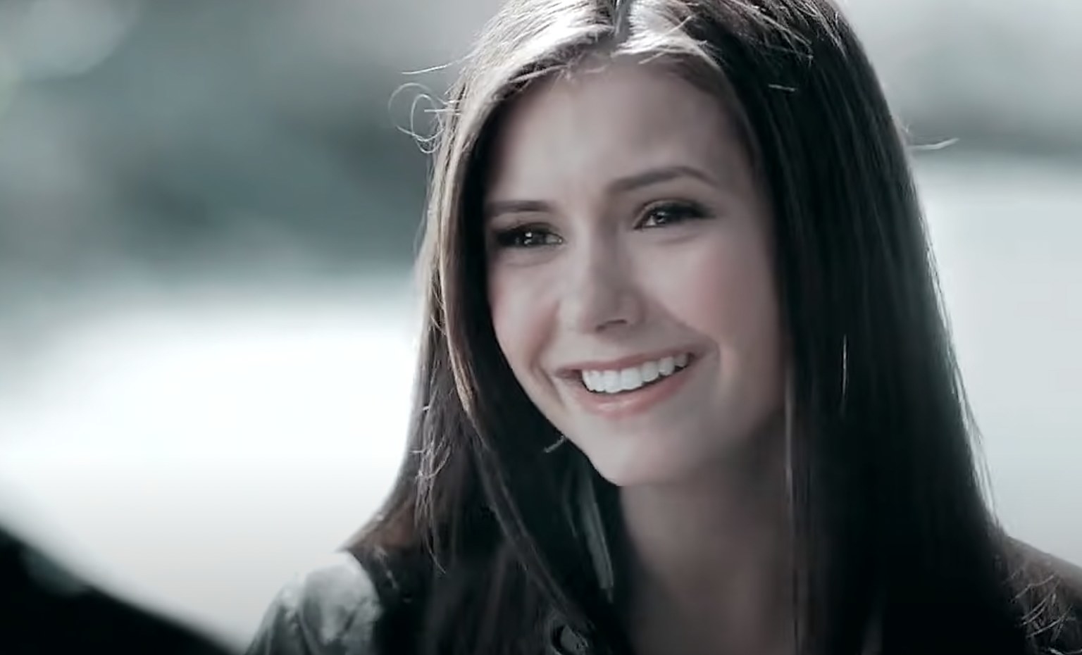 Elena smiling in The Vampire Diaries