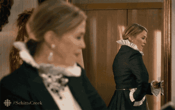 a gif of Moira in &quot;Schitt&#x27;s Creek&quot; turning around and saying to herself in the mirror &quot;Oh, hi!&quot;