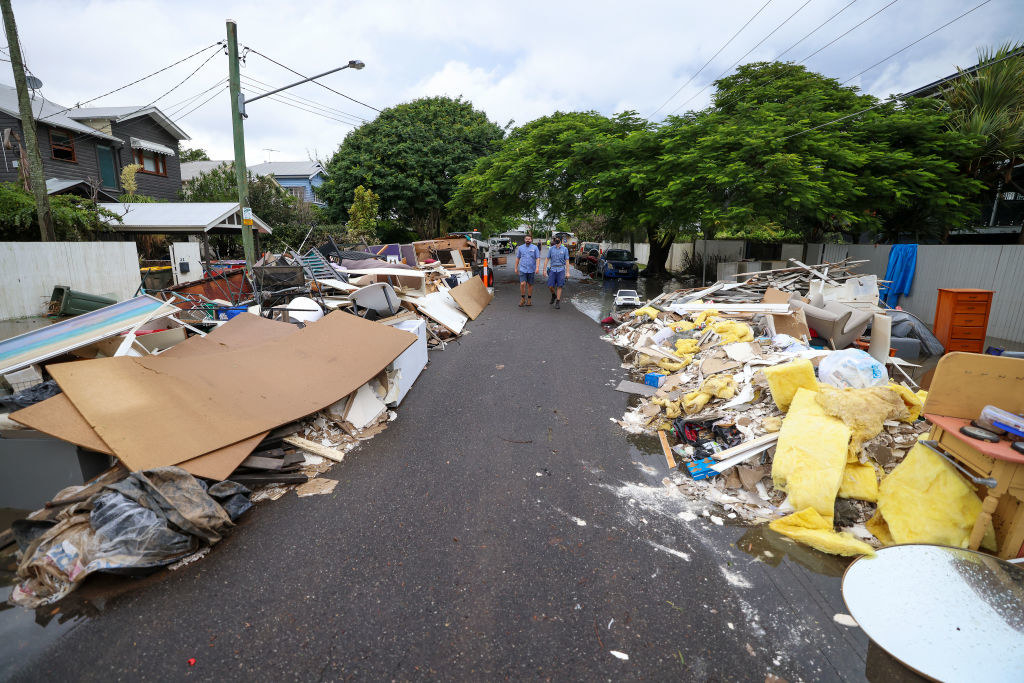 Rubbish piled up on both sides of a road in Brisbane, Australia