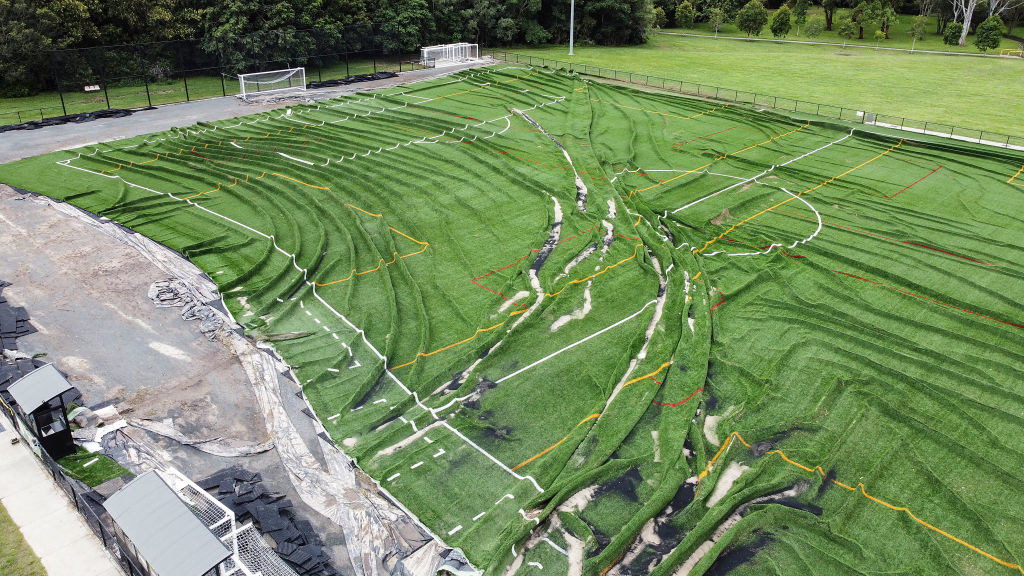 A football club&#x27;s field that was destroyed by floodwaters