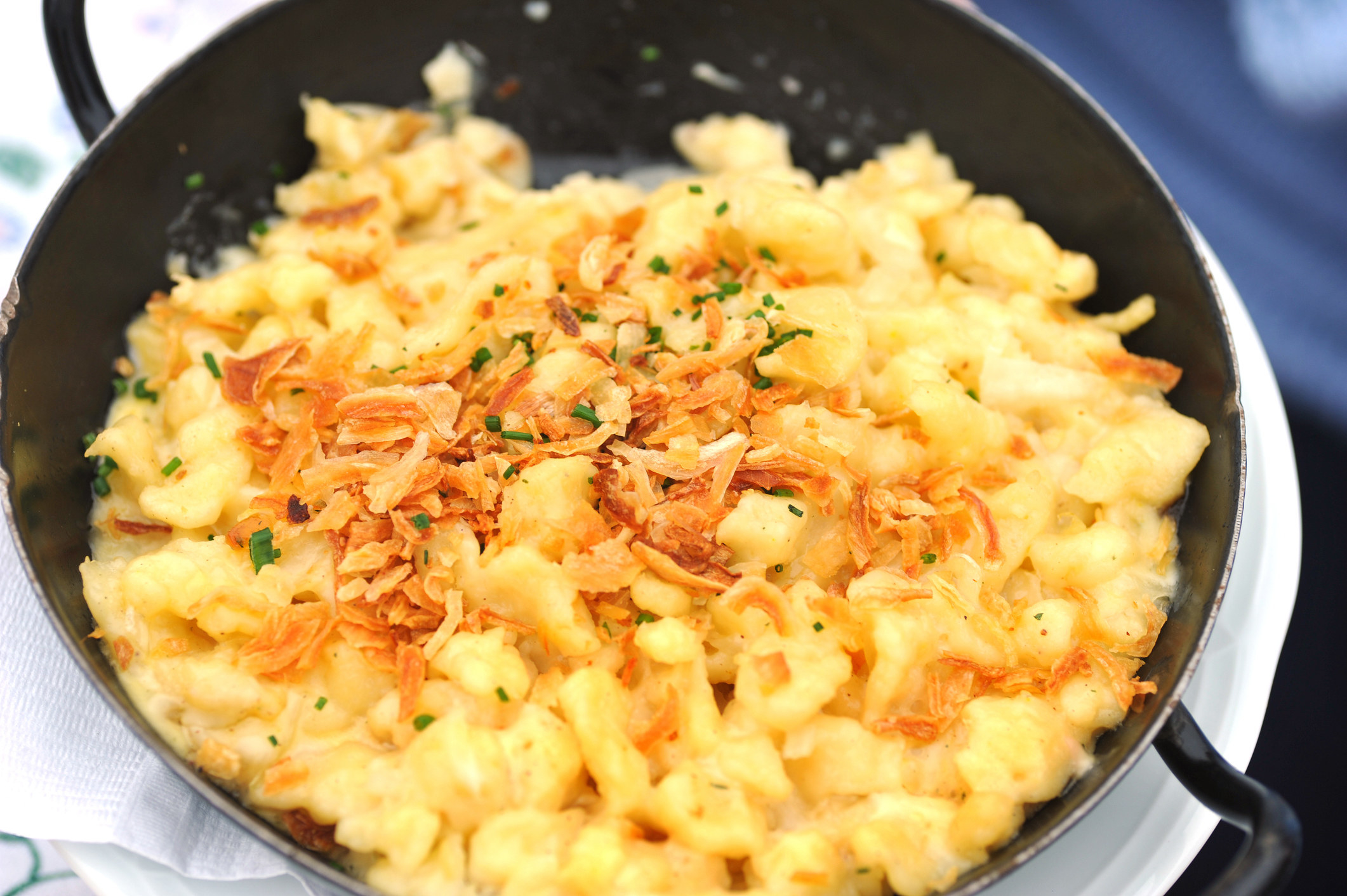 A skillet of cheesy noodles