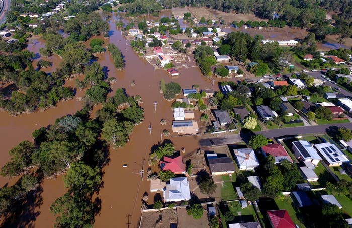 Properties in Brisbane are inundated by flood waters