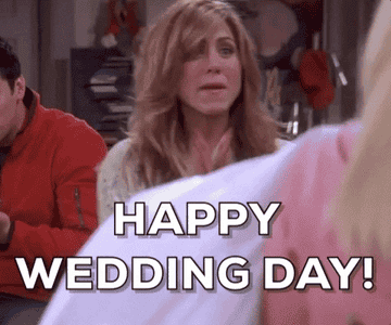 Jennifer Aniston as Rachel Green claps her hands together and says &quot;Happy wedding day!&quot; in &quot;Friends&quot;