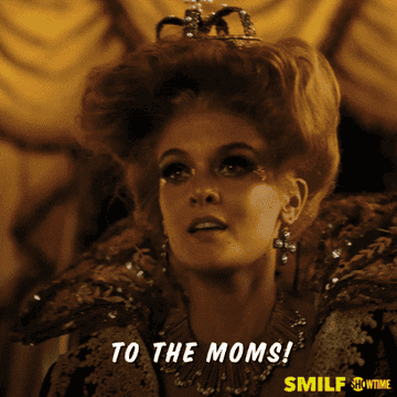 A woman says, &quot;To the moms!&quot;