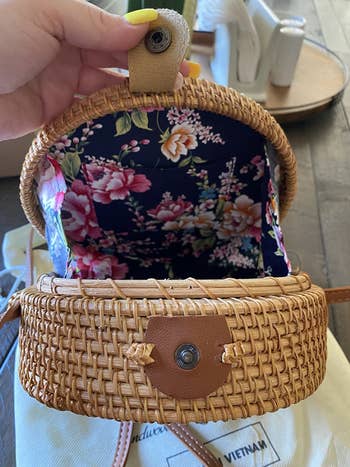a reviewer shows the inside of the purse