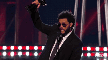 GIF The Weeknd accepting an award