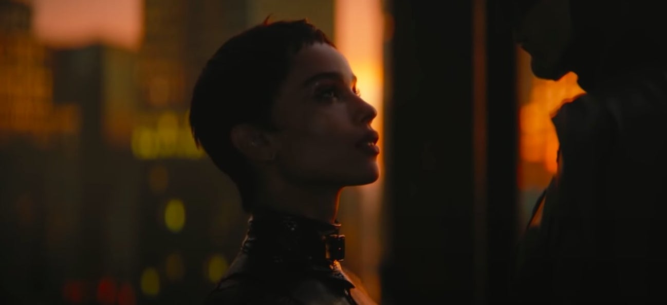 Selina staring up at Batman with the sun behind her in &quot;The Batman&quot;