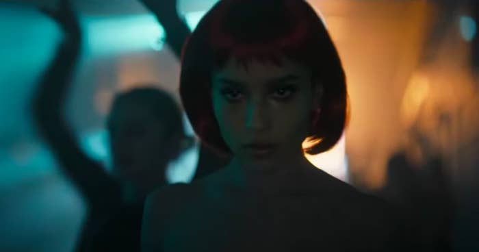 Selina wearing a red wig in the Iceberg Lounge in &quot;The Batman&quot;