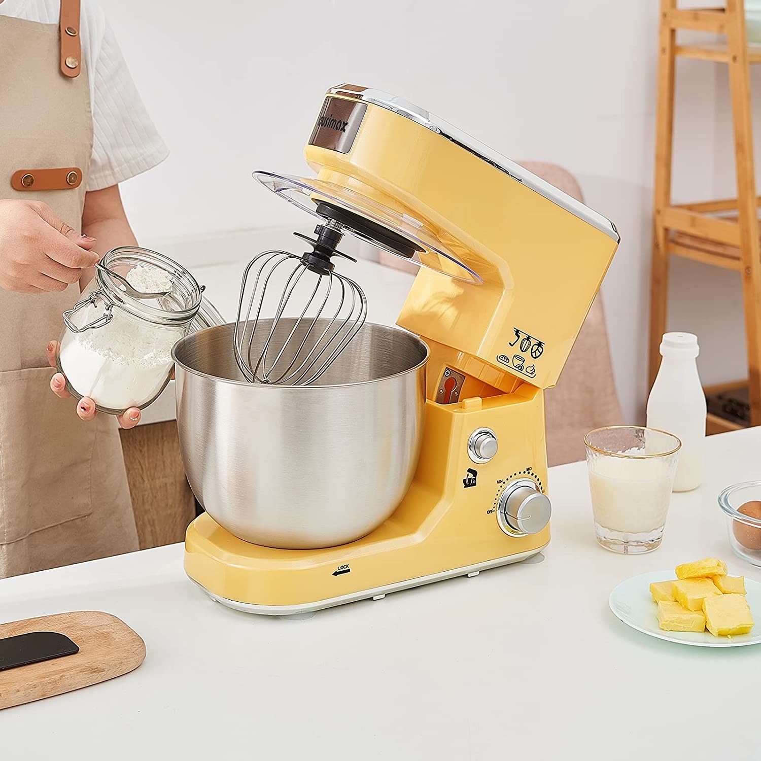 a yellow stand mixer