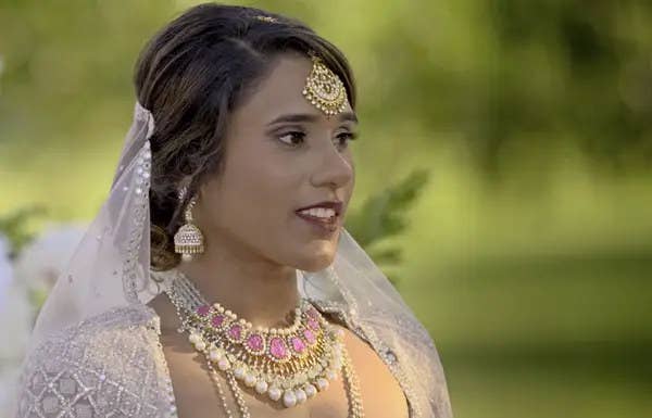 Deepti in Indian bridal wear at the altar